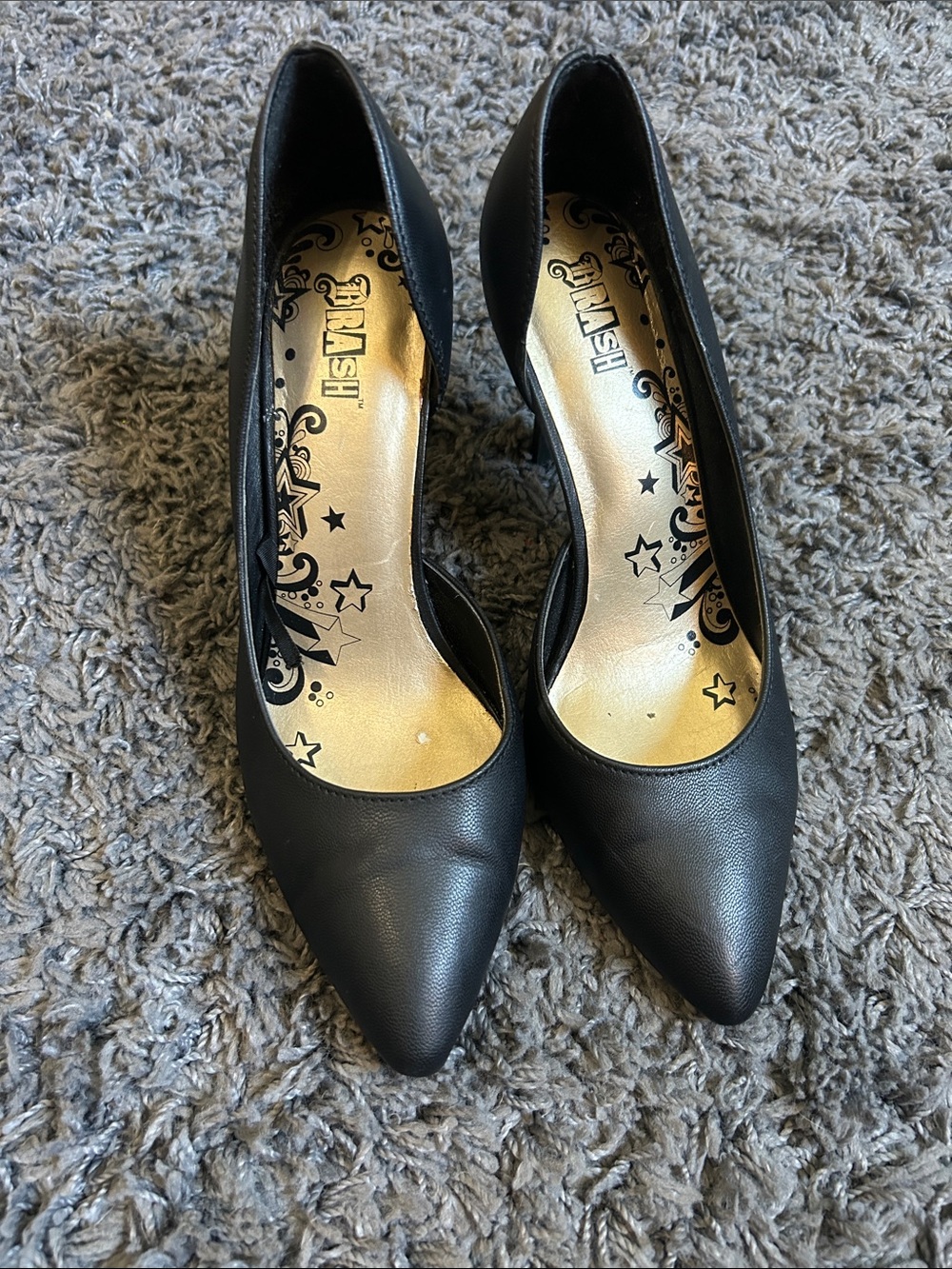 Brash Black Pointed-Toe Pumps with Gold Insole